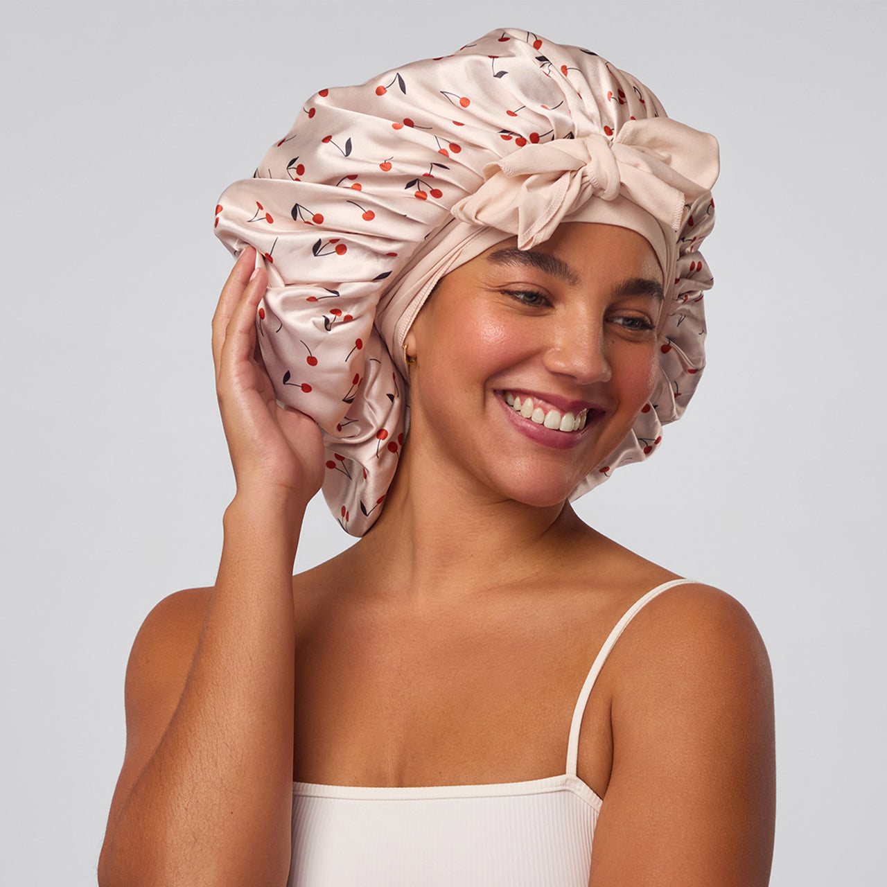 500621-AdjustableOversizedSatinBonnet-SeasonalCollection-CherryPrint-Model-1280x1280px.jpg