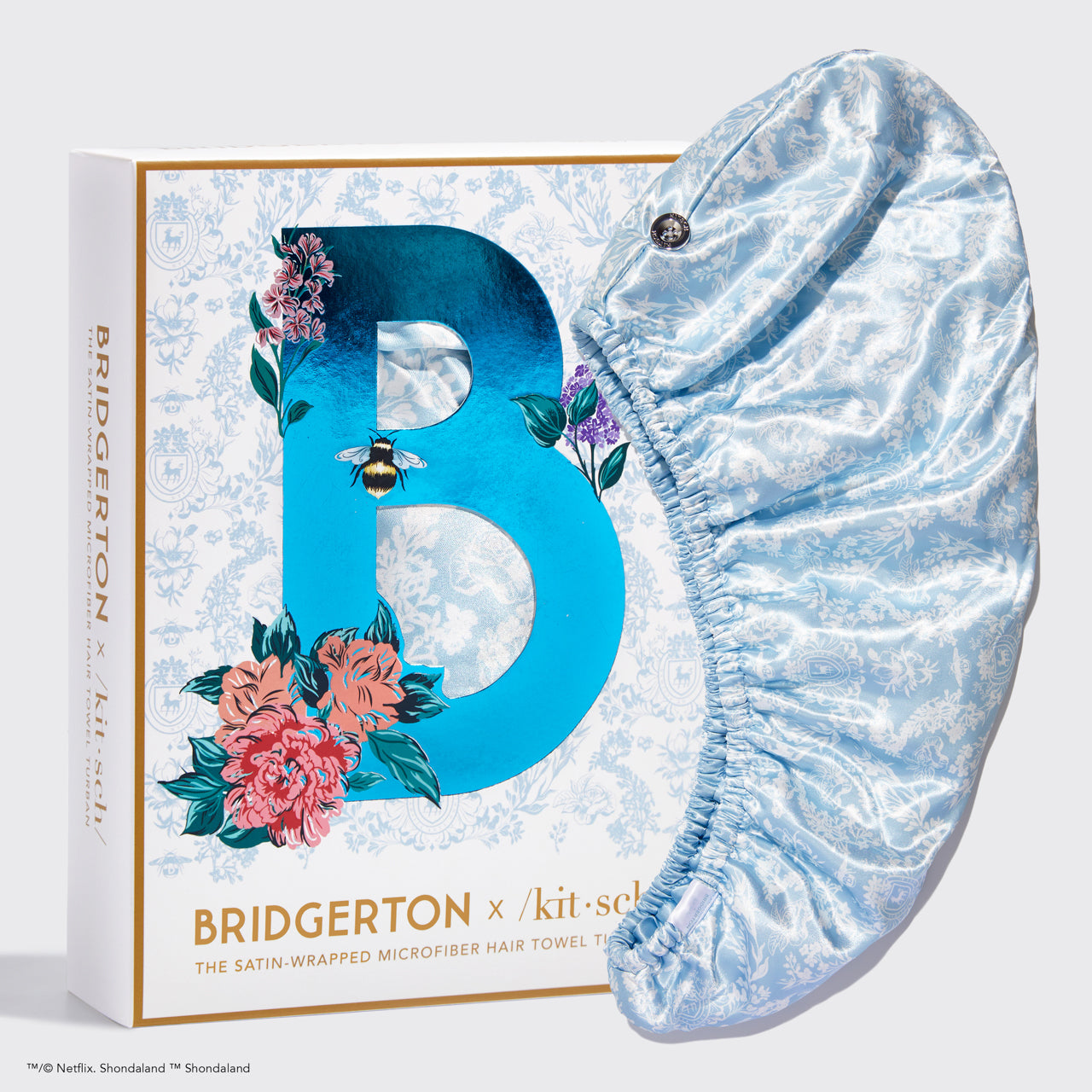 63610-BridgertonxKitsch-SatinWrappedHairTowelTurban-ToileDeBlue-hero-1280x1280px_841bac19-e663-4d33-997c-39d1fc948275.jpg