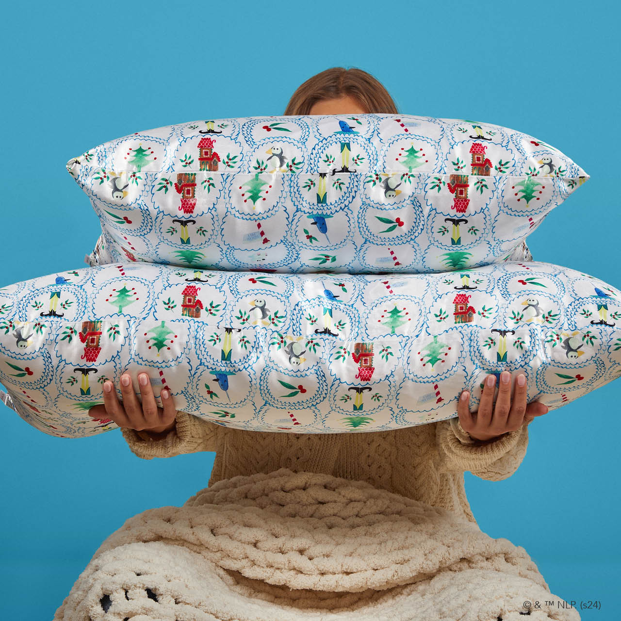 67144-67151-ElfxKitsch-Model-SatinPillowcase-NorthPole-2-Opt2-1280x1280px.jpg